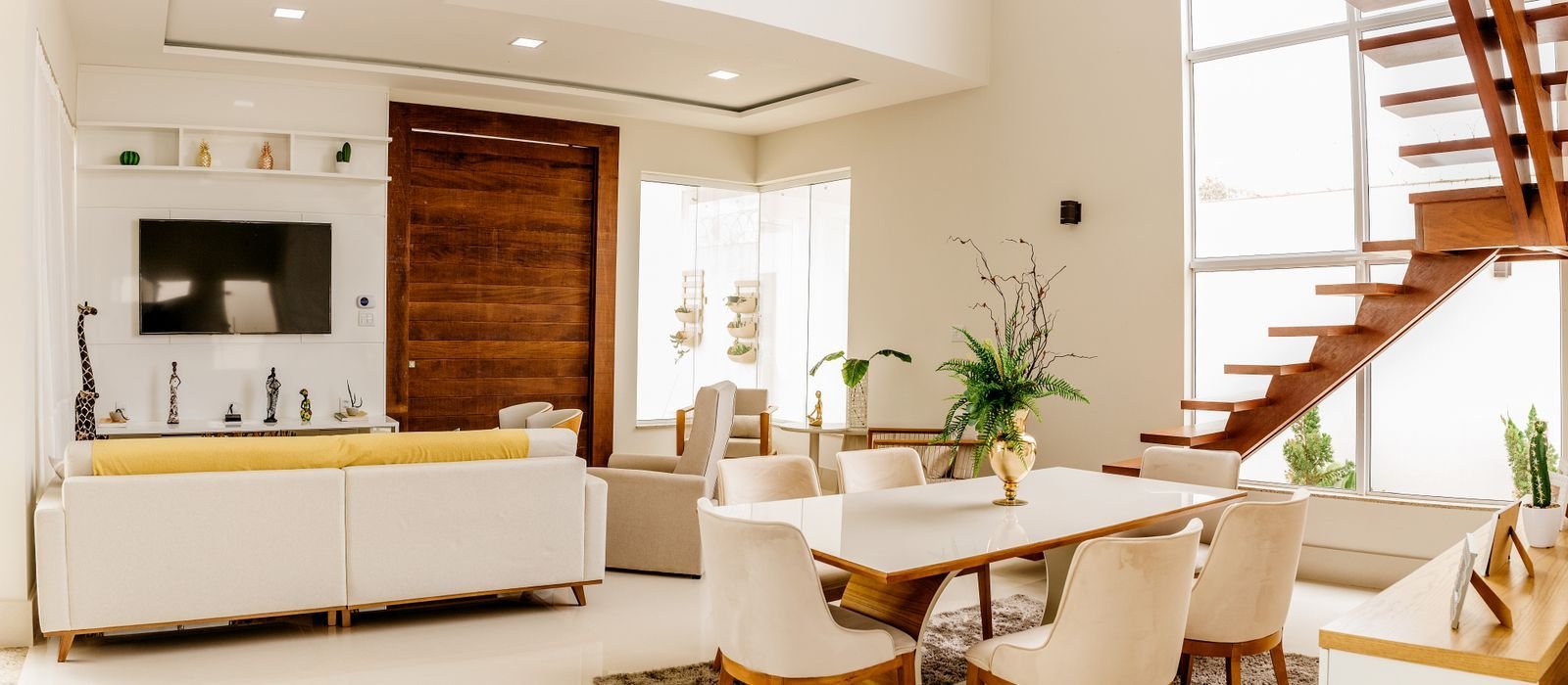 A bright open-plan living and dining space with clear routes between each area